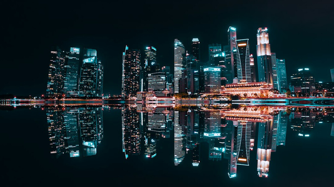 City skyline at night with lights