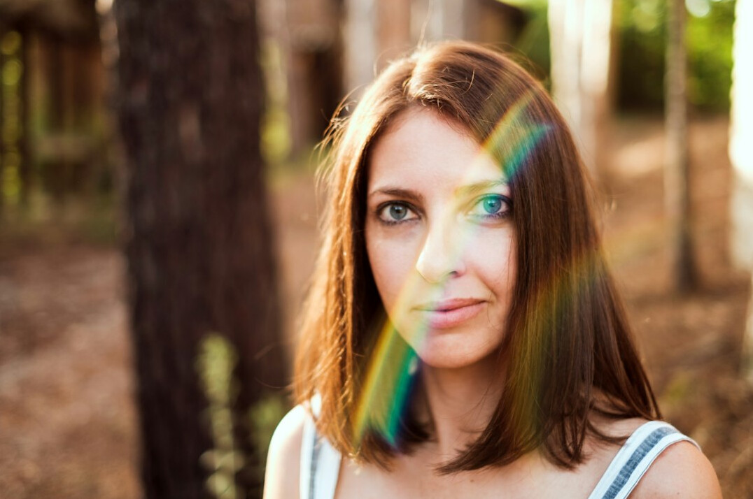 Portrait of a smiling young woman with brown hair