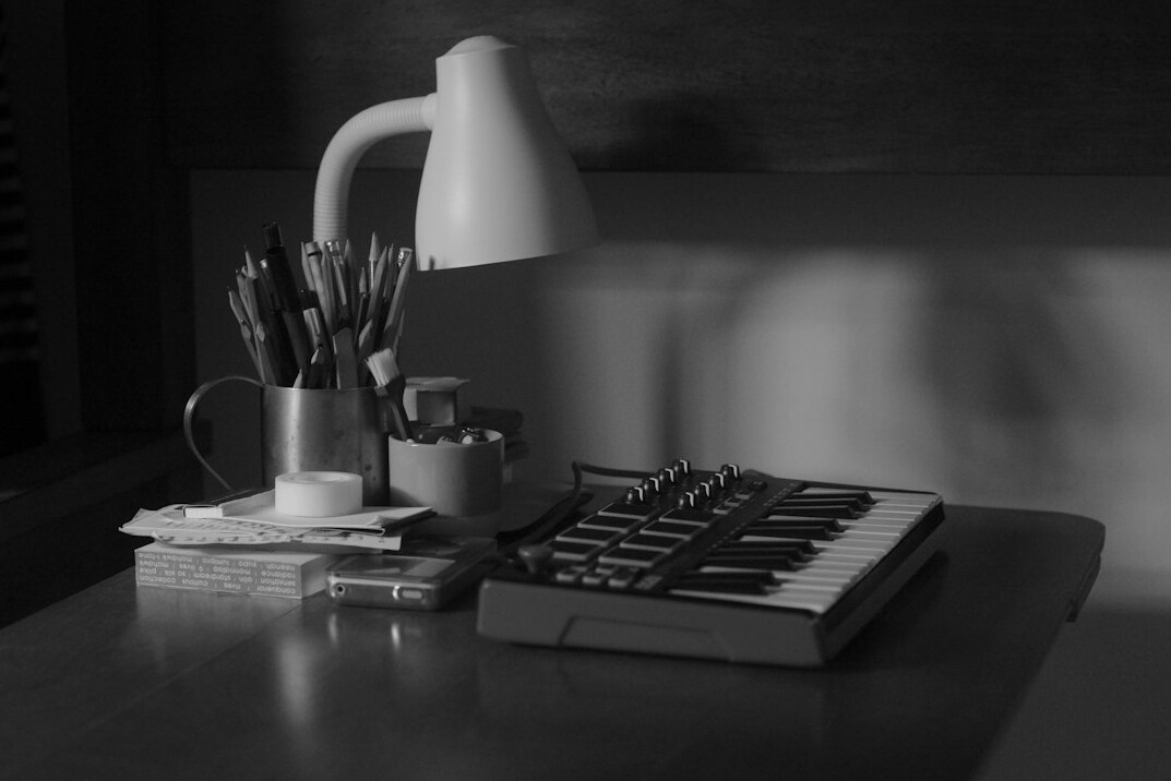 Desk with papers, calculator and notes