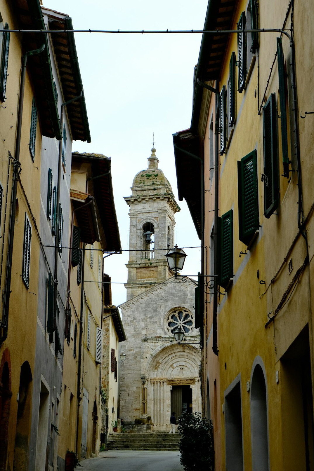 Narrow European old town alley with historic buildings